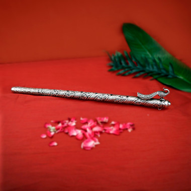 Decorative Silver Flute with Ornate Design