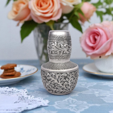 Intricately Carved Silver Jug